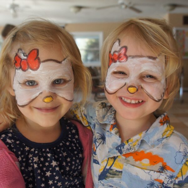 children with faces painted